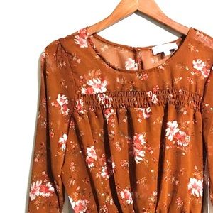 • ruffled floral smocked pumpkin/rust blouse •